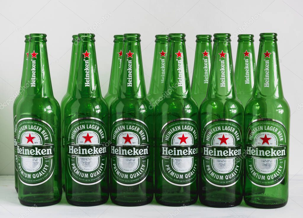 1 May , 2020, Saint Petersburg, Russia, close up of green empty beer bottles on a white background