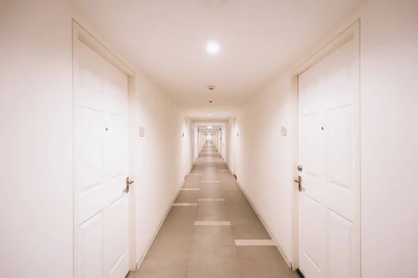Walkway inside white building