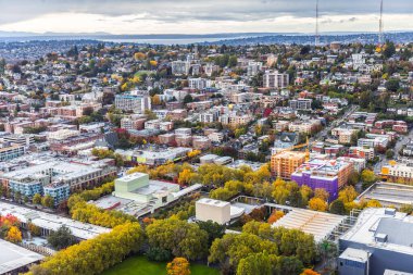 Seattle, Washington, USA - October 9, 2019: Aerial view of town in Seattle from Space Needle, small houses and buildings are on hill slope.