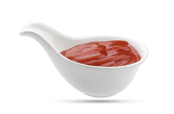 Кетчуп в миске изолирован на белом — стоковое фото
