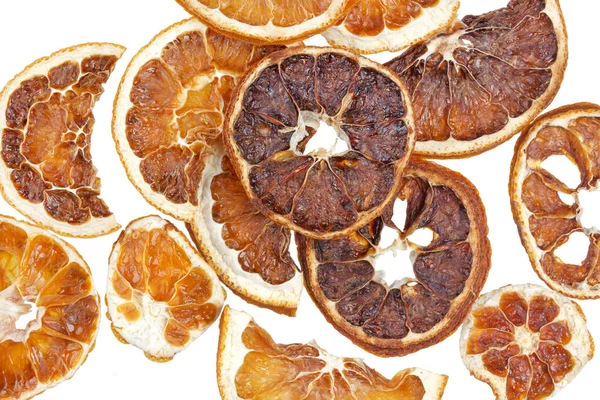 Rodajas de naranjas secas aisladas sobre fondo blanco —  Fotos de Stock