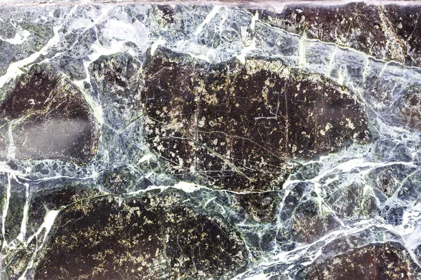 Black stone background with cracks, black marble