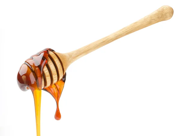 Miel aislada. Palillo de miel de madera aislado sobre fondo blanco con camino de recorte —  Fotos de Stock