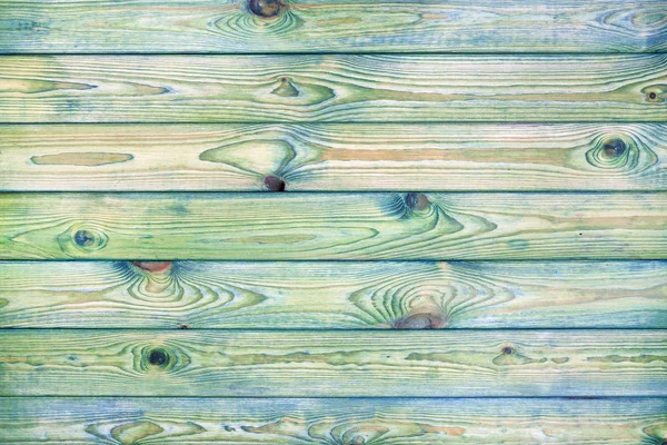 Hellblauer und grüner Holzhintergrund, altes zerkratztes Holz — Stockfoto
