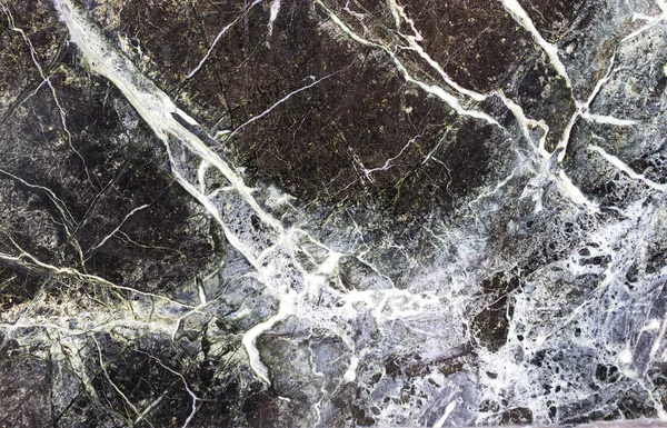Svart sten bakgrund med sprickor, svart marmor — Gratis stockfoto
