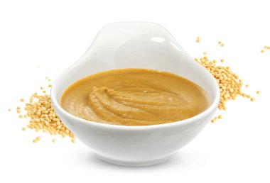 Hardal sosu ve üzerinde beyaz izole tohum