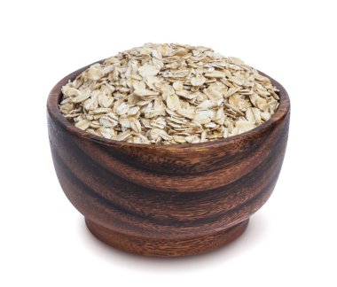 İzole yulaf ezmesi. Beyaz arka plan üzerinde ahşap kase yulaf gevreği