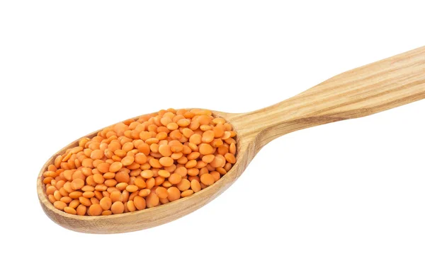 Red lentils in wooden spoon isolated on white background — Stock Photo, Image