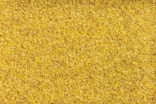 Bulgur wheat background or texture — Stock Photo, Image