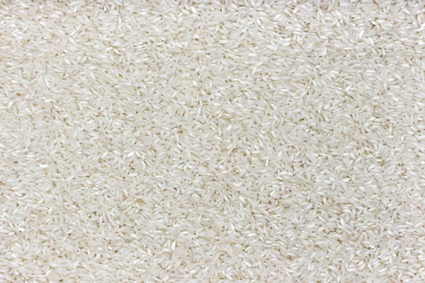 Reis Textur. polierte Reisgrütze Hintergrund — Stockfoto