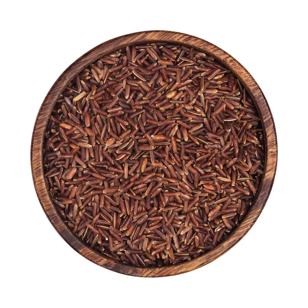 Rött ris gryn i trä skål isolerade på vit bakgrund. Ovanifrån — Stockfoto