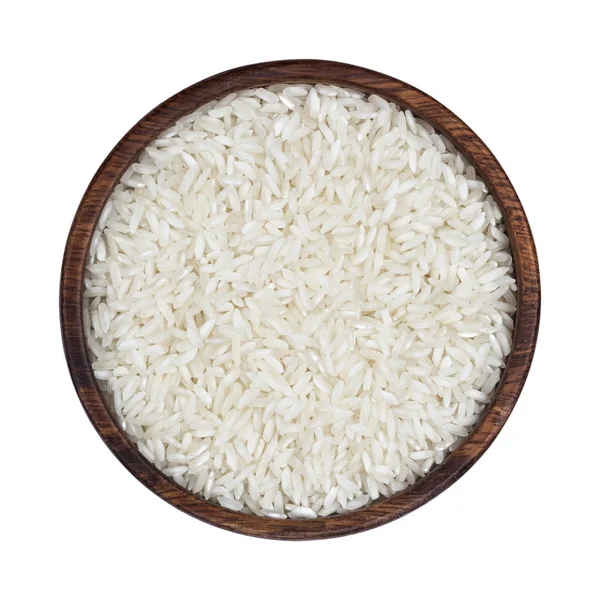 Basmati rice groats in wooden bowl isolated on white background. Top view — Stock Photo, Image