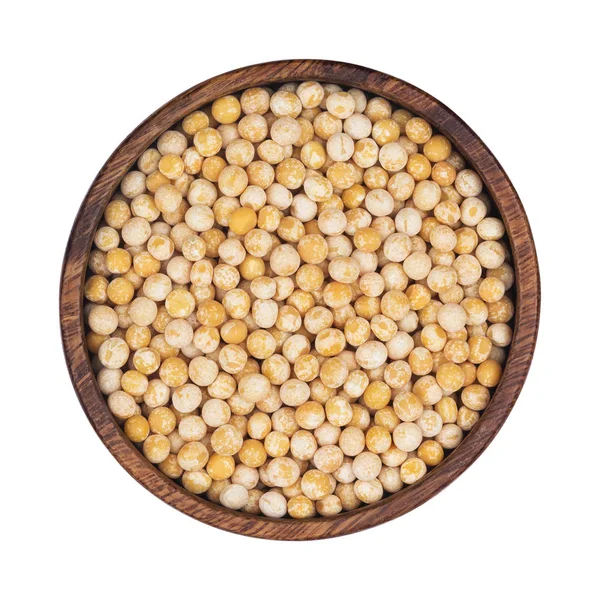 Ahşap plaka beyaz arka plan üzerinde izole kuru bezelye Üstten Görünüm.