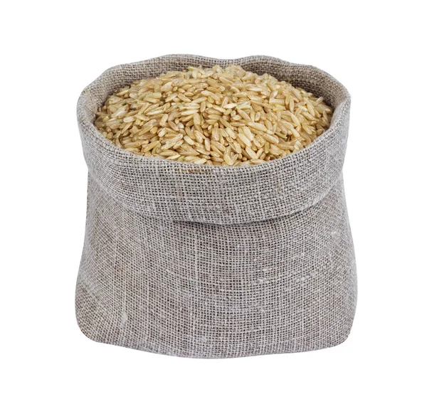 Brown rice in bag isolated on white background — Stock Photo, Image