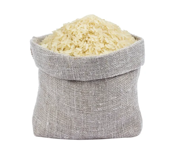Parboiled rice in burlap bag isolated on white — Stock Photo, Image