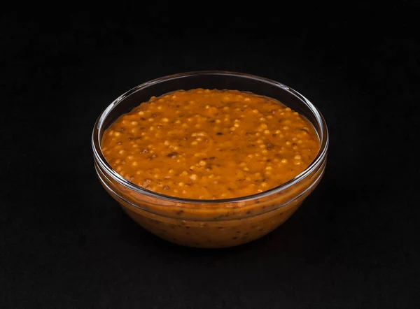 Sweet Bavarian mustard on black background — Stock Photo, Image