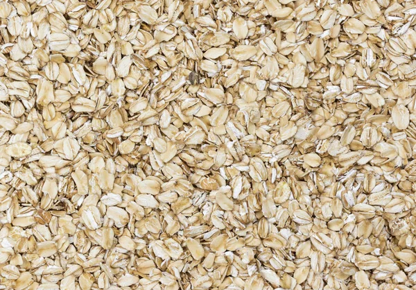 Oat flakes grain texture — Stock Photo, Image