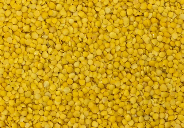Yellow lentils grain texture — Stock Photo, Image