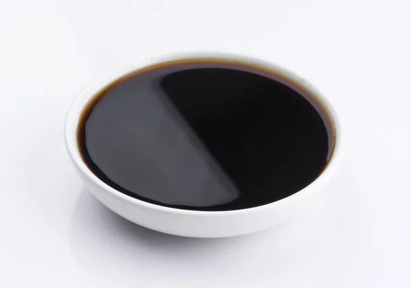 Plate of Soy sauce isolated on white background — Stock Photo, Image