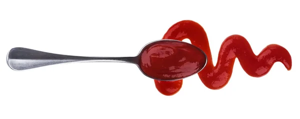 Ketchup. Salsa de tomate con cuchara aislada sobre fondo blanco. Vista superior — Foto de Stock