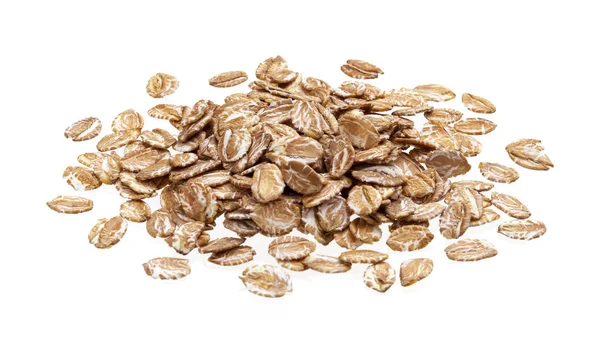 Pile of rye flakes isolated on white background — 스톡 사진