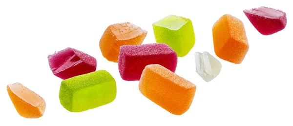 Падіння фруктових мармеладних цукерок ізольовано на білому тлі — стокове фото
