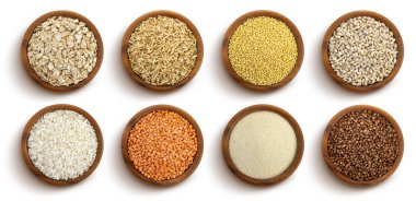 Cereals, grains and seeds in bowls isolated on white background, top view