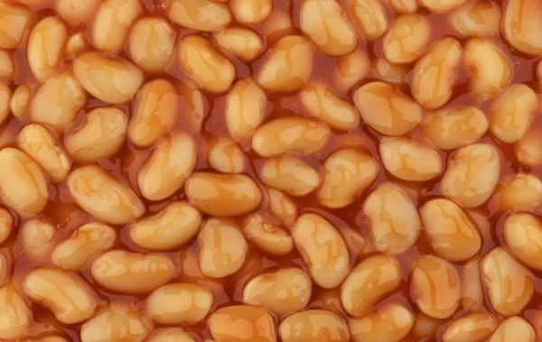 Baked beans in tomato sauce texture or pattern — Stock Photo, Image
