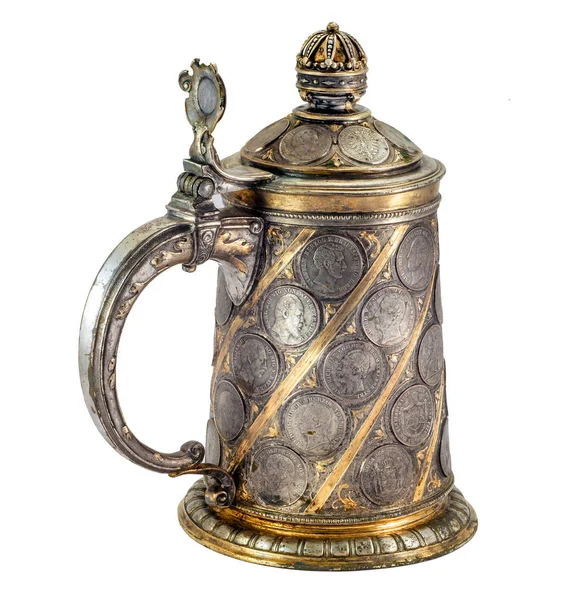 Old German beer mug with coins Stock Photo by ©2daydesign 159950178