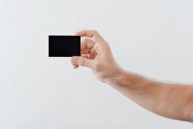 siyah bir kağıt yazıt için elini tutar