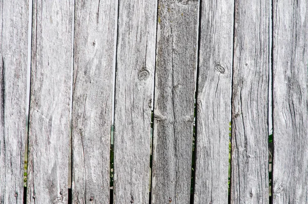 Vecchie assi di legno grigie, recinzione. Sfondo vintage — Foto Stock