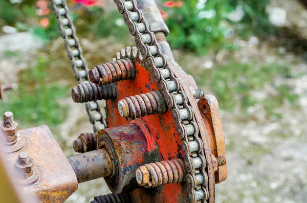 Parts of old broken machine under corrosion closeup. Old technic