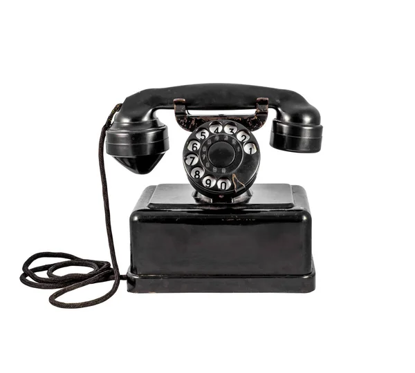Oude vintage zwarte telefoon op witte achtergrond — Stockfoto