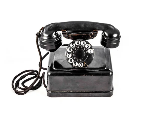 Vecchio telefono nero vintage su sfondo bianco — Foto Stock