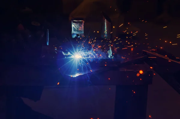 Metal welding in metal workshop. Clear light, blue tinting — 스톡 사진