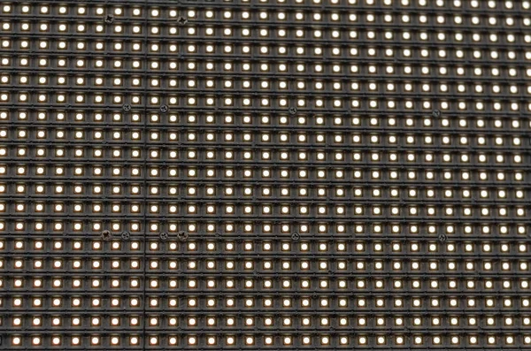 Street LED information screen close-up. LED panel. Lots of leds on black background.