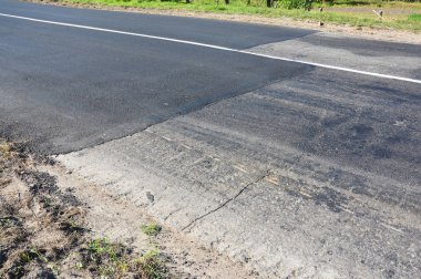 Asfalt yol onarım. Yeni asfalt yol döşeme.