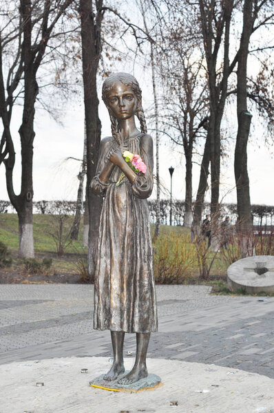 KYIV, UKRAINE - OCTOBER, 20, 2016: The memorial girl to the victims of Holodomor 1932 -1933 years. A memorial dedicated to the Terror-Famine in Ukraine.