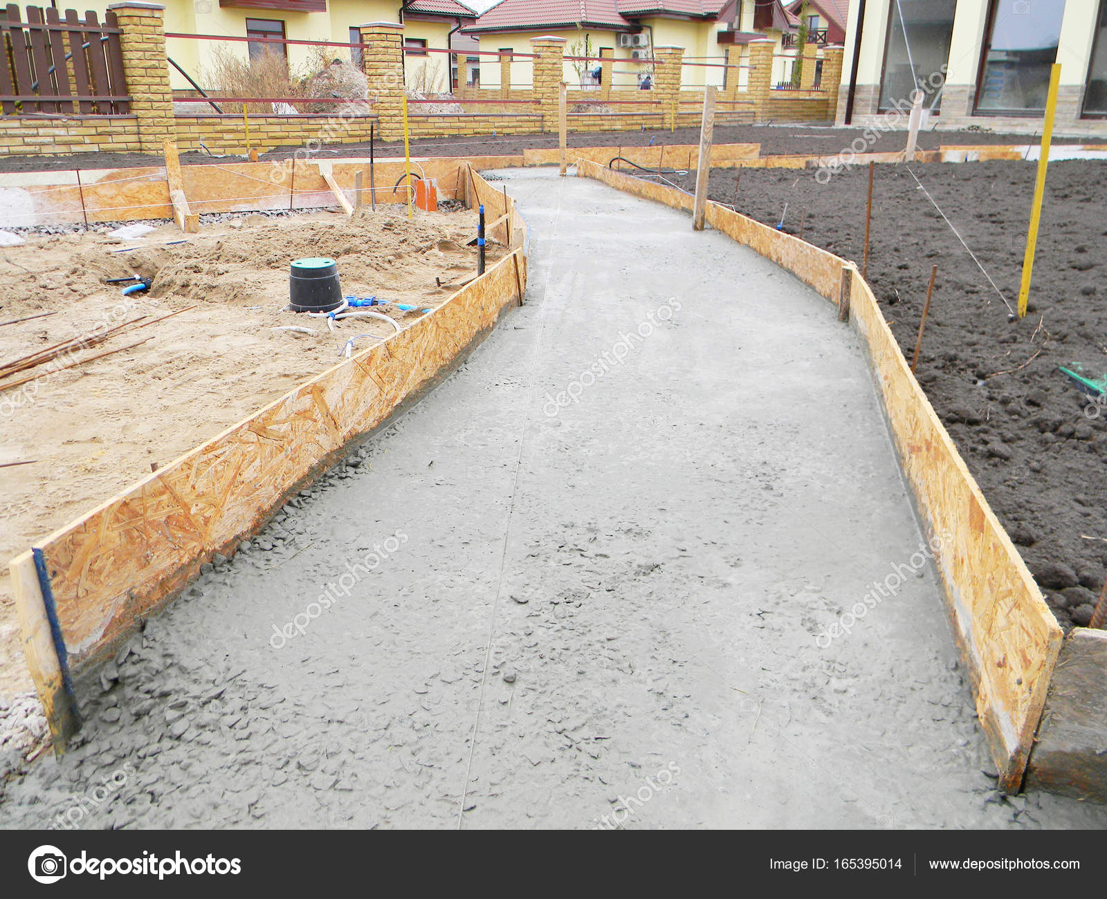 Building new concrete pavement foundation in the garden. Foundation for