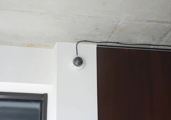 Security  CCTV camera is mounted on the room wall. — Stock Photo, Image