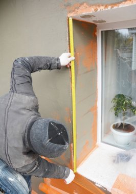 Oluşturucu ölçü sıva duvar fiberglas fileli sıva kafes katı yalıtım sonra. 