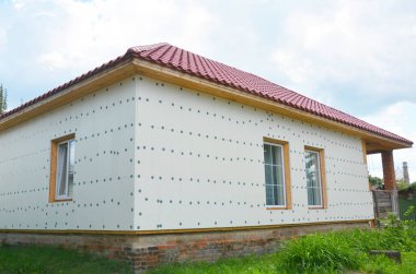 Bitmemiş ev yalıtım ile fiberglas ağ, sıva gözenekli, sert köpük yalıtım duvar sıvama için hazır. 