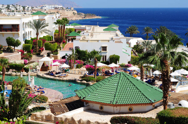 SHARM EL SHEIKH, EGYPT - NOVEMBER 18, 2019: The tourists are on vacation at popular hotel resort in Sharm el Sheikh, Egypt.