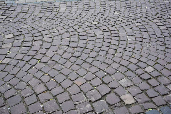 Alte europäische Kopfsteinpflaster strukturierten Hintergrund — Stockfoto