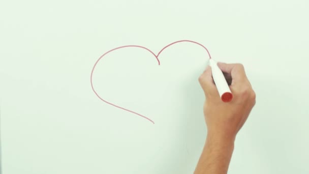 Hand drawn, crayon heart shape isolated on whiteboard — Stock Video