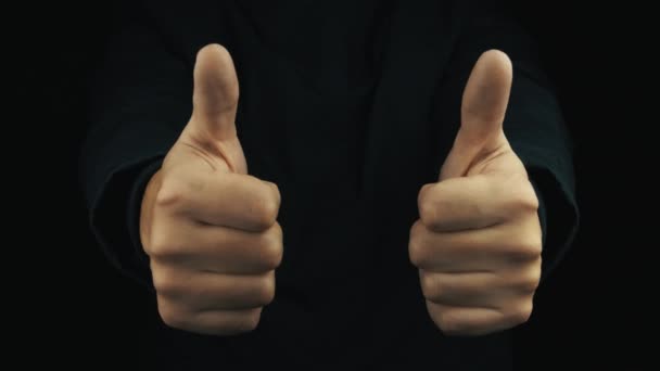 Męskiej ręki w długi rękaw kurtki palec gesty, naśladowanie gry na joypad — Wideo stockowe
