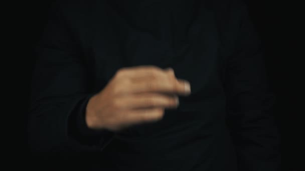 Male hand in long sleeve jacket give disrespectful flip off finger sign gesture — Stock Video