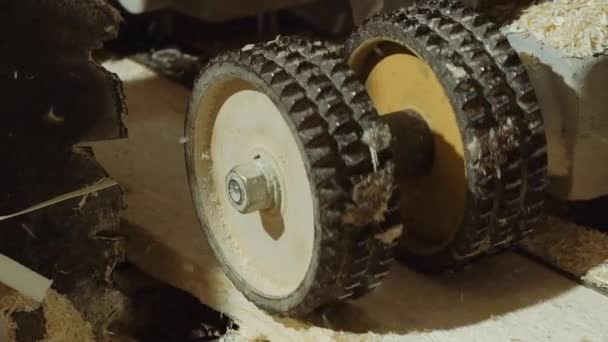 Spinning wheels of plank refiner machine at sawmill factory — Stock Video