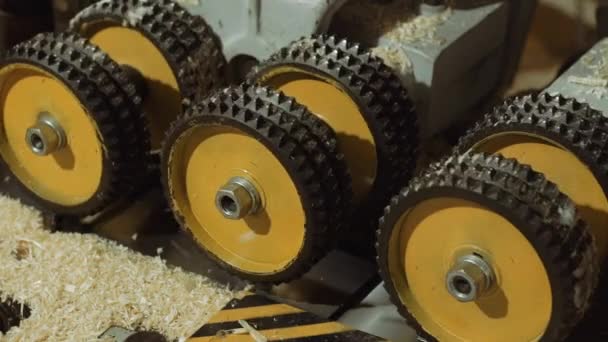 Spinning wheels of board refiner machine at carpenter production — Stock Video