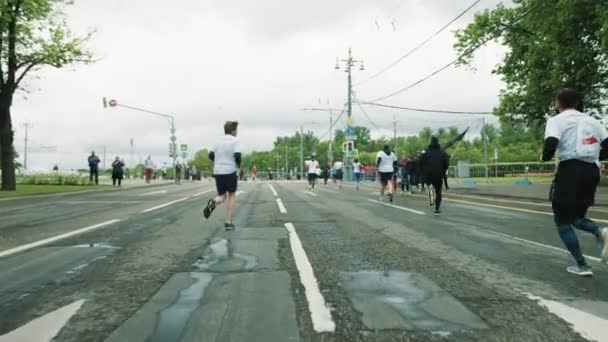 Homem atlético com perna protética esportiva maratona de corrida — Vídeo de Stock